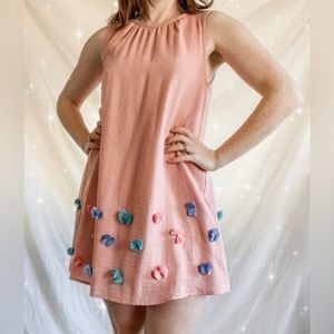 Sleeveless Peach Mini Dress with bow detailing. Size M